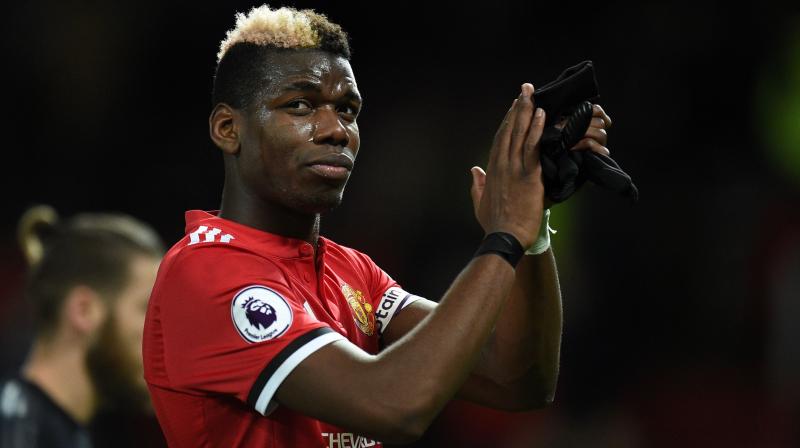 The club has had to deny the claim that Pogba sent a text message to Woodward demanding he be allowed to leave. (Photo: AFP)