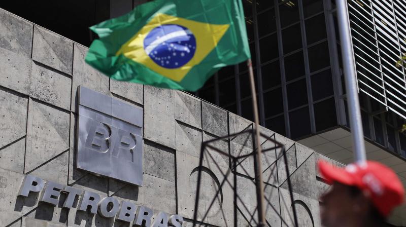 More than 100 politicians suspected of accepting bribes from powerful construction conglomerates for themselves or for their political party in exchange for allowing the builders to overcharge contracts with state oil giant Petrobras. (Photo: AP)