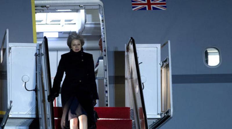 British Prime Minister Theresa May steps off from her plane upon her arrival at Andrews Air Force Base. (Photo: AP)