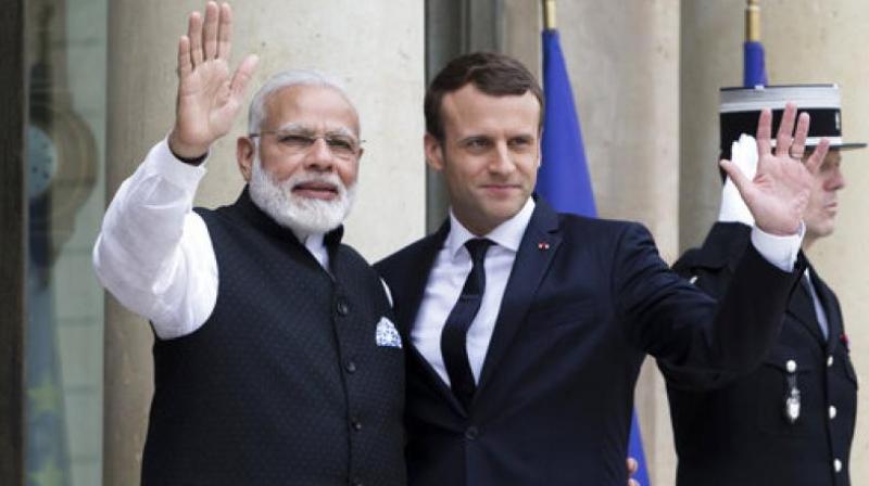 Prime Minister Narendra Modi and French President Emmanuel Macron have been jointly awarded with the UNs highest environmental honour for their pioneering work in championing the International Solar Alliance and promoting new areas of cooperation on environmental action. (Photo: AP)