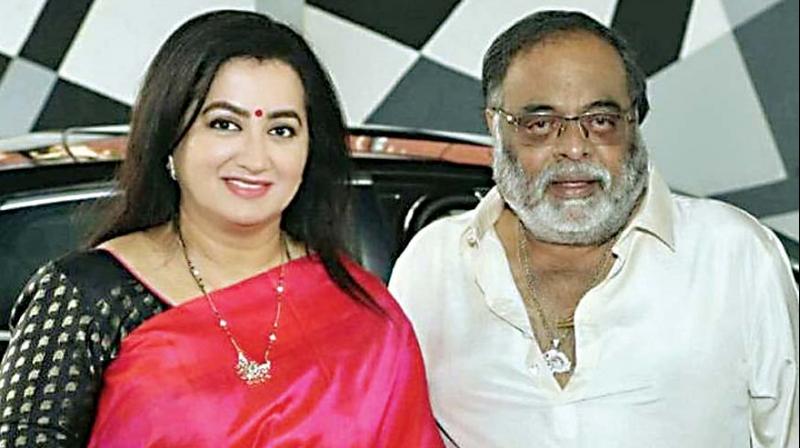 In this photo, actress Sumalatha is seen with her husband and actor-politician late Ambareesh.