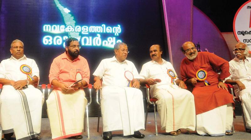 Ministers A.C. Moideen, Kadakampally Surendran, E. Chandrasekharan and Thomas Isaac with Chief Minister Pinarayi Vijayan during the first anniversary celebrations of LDF government at Nisagandhi auditorium on Thursday. (Photo: A.V. MUZAFAR)