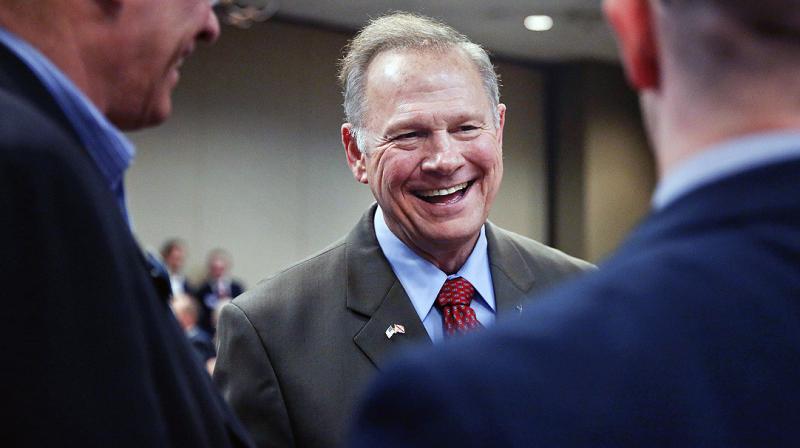 Four women, speaking on the record, told The Washington Post that Moore pursued them when they were 18 or younger, while he was in his early thirties working as an assistant district attorney. (Photo: AP)