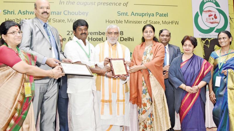 Tamil Nadu awarded for the highest number of transplantations in any state across the country for the fourth consecutive year on Tuesday. Health minister C. Vijayabaskar receives the award from Anupriya Patel, Union minister of state. (Photo: DC)