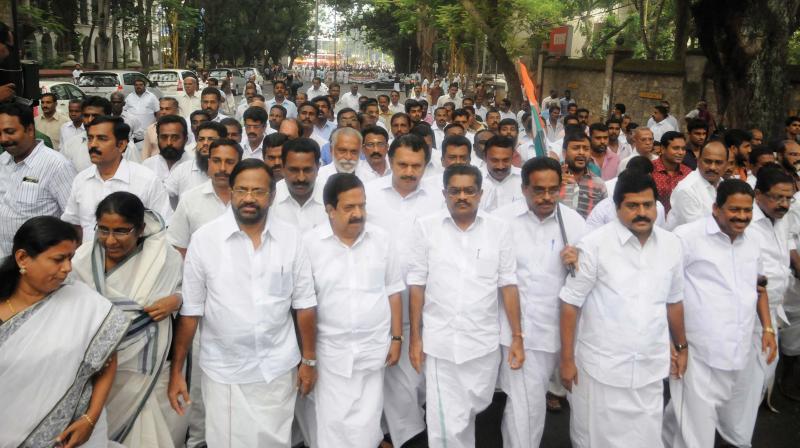 KPCC president V. M. Sudheeran leads the partys Raj Bhavan march in Thiruvananthapuram on Monday against the Centres decision to demonetise Rs 500 and Rs 1,000 notes. Opposition leader Ramesh Chennithala, Congress leaders K. Muraleedharan, Karakulam Krishnapillai, Palode Ravi, T. Saratchandra Prasad and Rajmohan Unnithan, Shanimol Usman and Bindu Krishna are also seen. (Photo: A.V. MUZAFAR)
