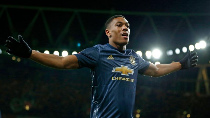 United announced that the France striker had signed a new contract that commits him to the club until at least June 2024, with the option for a further year. (Photo: AFP)