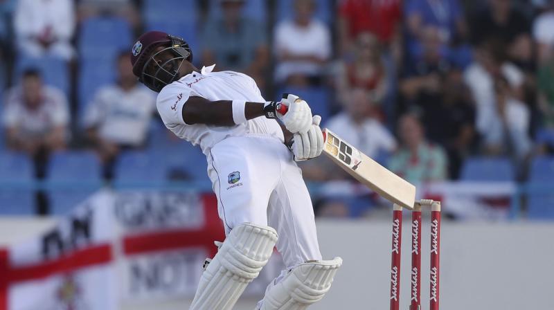 Bravo faced 165 balls, almost a whole sessions worth on his own, and was 33 not out at stumps to help West Indies to 272-6 in reply to Englands 187. (Photo: AP)