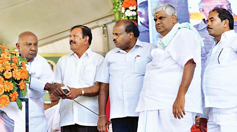 JD(S) supremo H.D. Deve gowda, CM H.D. Kumaraswamy and minister H.D. Revanna inaugurate development works at Arkalgud in Hassan on Tuesday 	 KPN