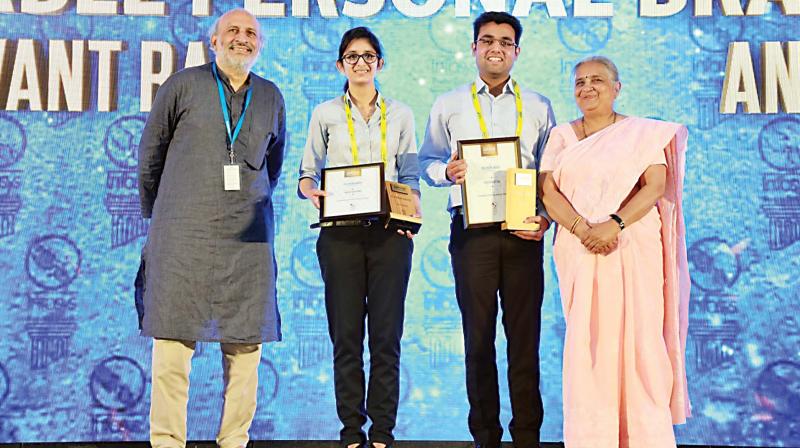 Sudha Murty, chairperson, Infosys Foundation with Platinum award winners Khushwant Rai and Anjalin Khurana.