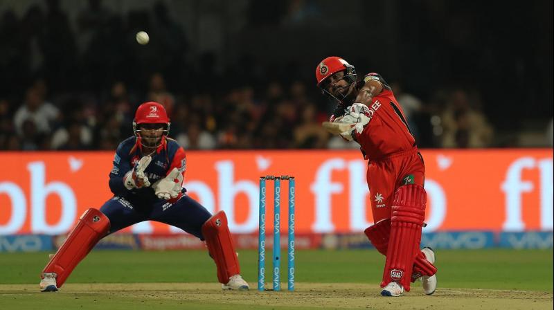Kedar Jadhavs counterattacking fifty has led Royal Challengers Bangalores fightback after Delhi Daredevils had scalped three early wickets. (Photo: BCCI)