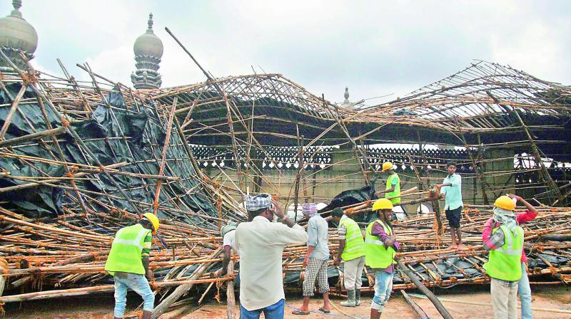 A temporary shed that was put up on the terrace of the Macca Masjid collapsed due to the heavy rains on Thursday. ( Pics: P.Surendra, S. Surender Reddy, Deepak Deshpande)