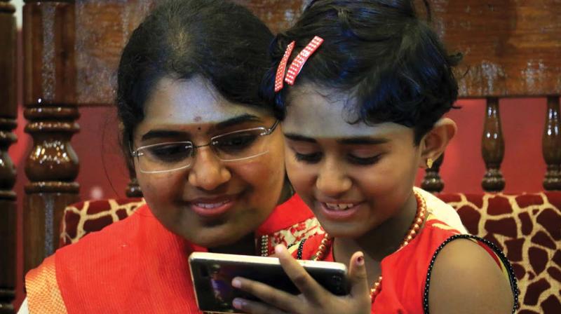 Six-year-old Shreemali Balasooriya, from Sri Lanka, chats with Dr Kanmani Kannan after they met for the first time in Kochi on Thursday.