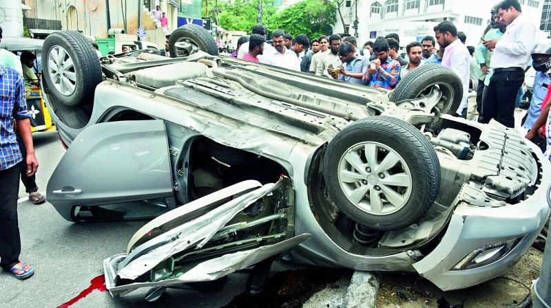One person died and another badly injured when the car they were travelling in at Banjara hills on Tuesday  hit the road divider. (Photo:DC)