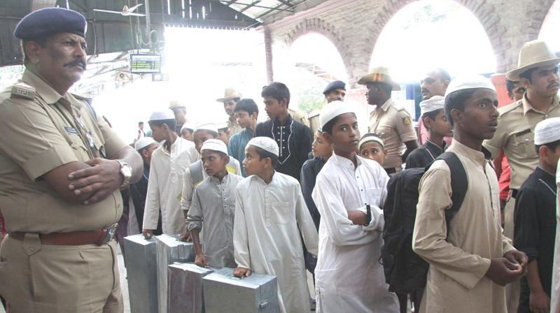 More than 100 madrasa students and 16 rectors from Guwahati being questioned by the CCB and Railway police, in Bengaluru on Tuesday 	(Photo:DC)