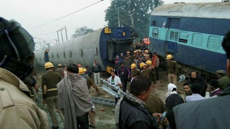 Rescue and relief works in progress at the site of accident where Ajmer-Sealdah express train derailed early morning near Rura railway station in Kanpur Dehat district on Wednesday. (Photo: PTI)