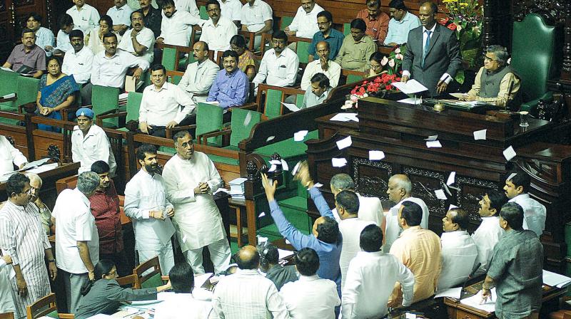 A file photo of legislators from Opposition parties staging a dharna against the Siddaramaiah government during the last monsoon session of the Assembly in Bengaluru  (Photo: KPN)