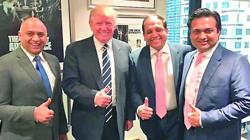 The three Indian real estate executives flew from India to congratulate Mr Trump on his victory