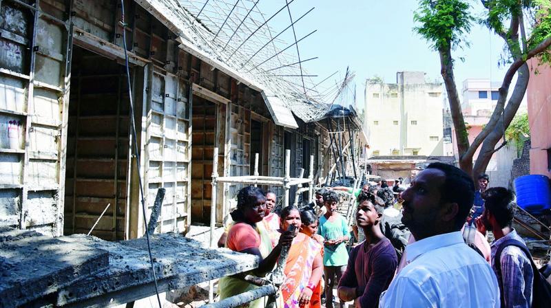 The roof of the marketing building, collapses at Santapet in Nellore city. Vendors protest for more than an hour.  	 DC