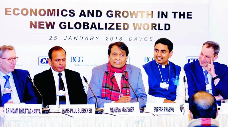 Minister for IT Nara Lokesh, Union minister Suresh Prabhu and others at the CII meeting at Davos on Thursday.