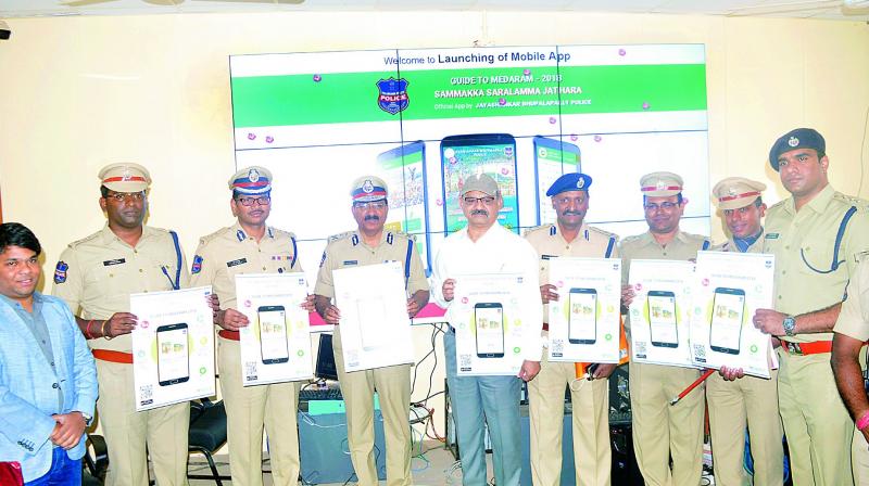 DGP M Mahendar Reddy launching the Guide to Medaram app on Thursday.