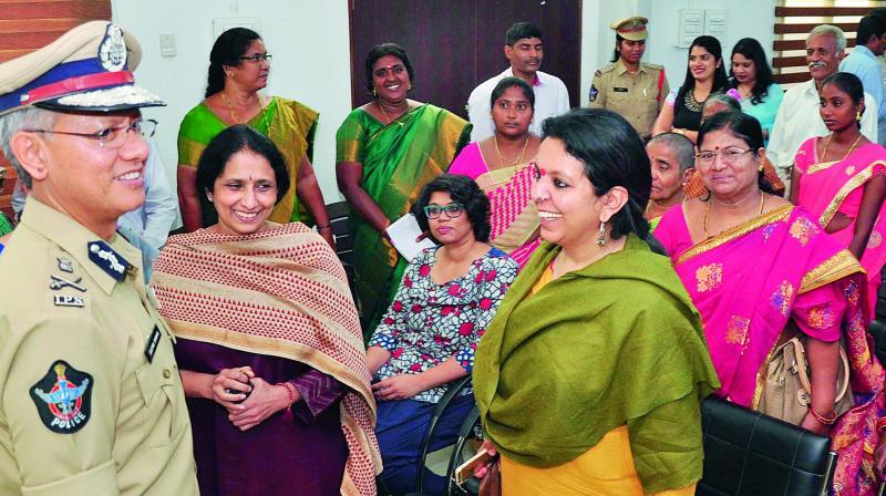 Commissioner of Police D. Gautam Sawang interacts with Mahila Mitra members at a programme held marking its first anniversary in Vijayawada on Thursday.  (Photo: DC)