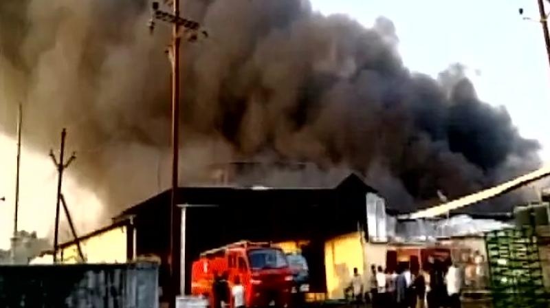 Thick smoke from burning polyester billowed from the unit making fire-fighting operation difficult. (Photo: ANI Twitter)