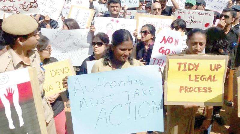 Parents protest against sexual abuse of schoolchildren at Bellandur in Bengaluru on Sunday 	 KPN