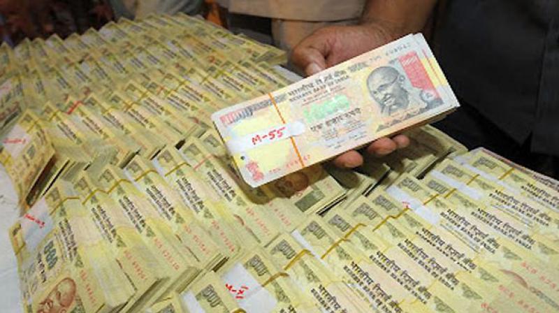 West Zone Task Force police arrested two individuals and seized Rs 1.13 crore in old demonetised currency