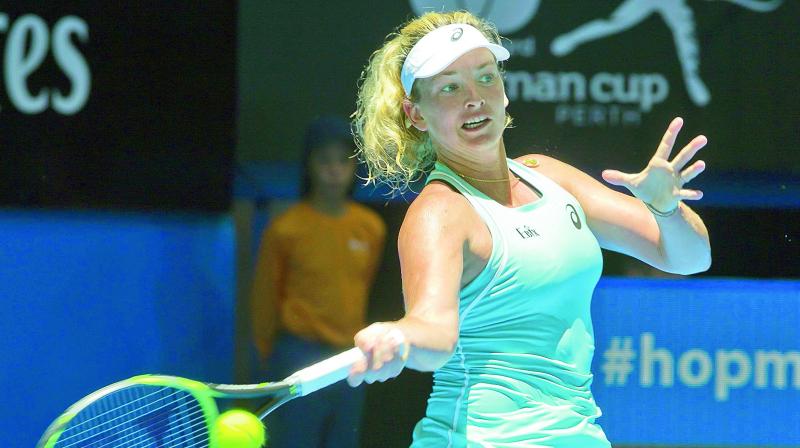 US Coco Vandeweghe hits a return against Anastasia Pavlyuchenkova of Russia during their womens singles match of the Hopman Cup tennis tournament in Perth on Saturday. CoCo won 6-3, 6-3. (Photo: AFP)