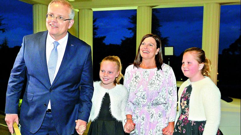 Australias incoming Prime Minister Scott Morrison with his wife Jenny Morrison and daughters Abbey and Lily at the oath-taking ceremony in Canberra on Friday. (Photo: AFP)