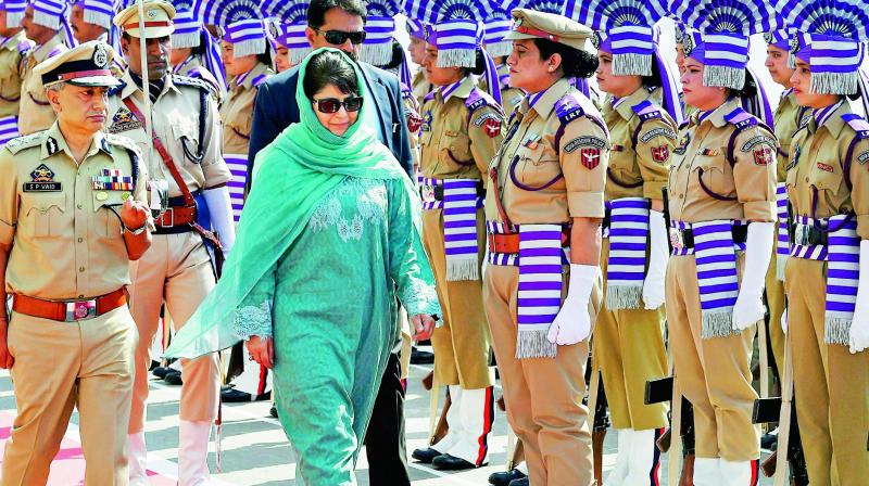 Jammu and Kashmir Chief Minister Mehbooba Mufti inspects the guard of honour on the first day after the bi-annual Darbar move on Monday. (Photo: PTI)