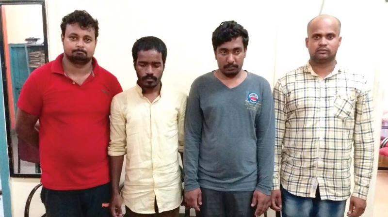 The accused N. Manjunath, Mahadeva, Mahesh and Swamy in police custody.