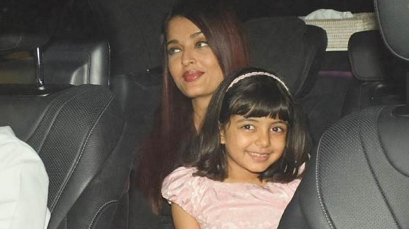 As they stepped out, the paparazzi got clicking. As expected, Aaradhyas friend got overwhelmed with the flashlights. But Aaradhya handled the situation like a pro.