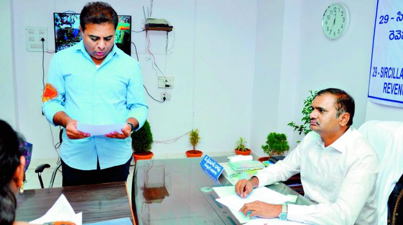 Caretaker minister K.T. Rama Rao files his  nomination papers from Sircilla on Monday.