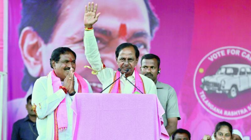 Telangana caretaker Chief Minister K. Chandrasekhar Rao addresses a public meeting at Palakurthy. TRS candidate Errabelli Dayakar Rao is also seen. (Photo: DC)