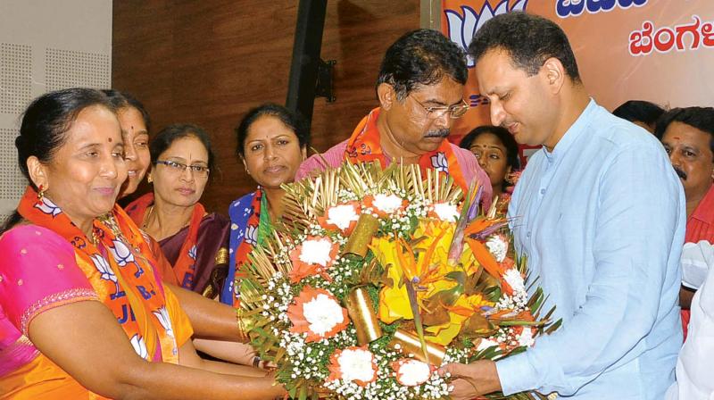 Bengaluru BJP leaders led by R. Ashok felicitating Union Minister Ananth Kumar Hegde in Bengaluru on Saturday (Photo:DC)