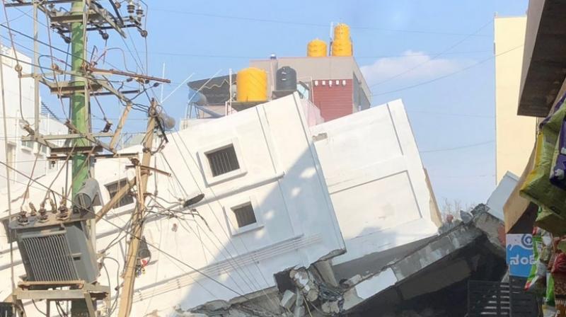 An under-construction building collapsed at Kasavanahallis Sarjapur road on Thursday. (Photo: Twitter | ANI)