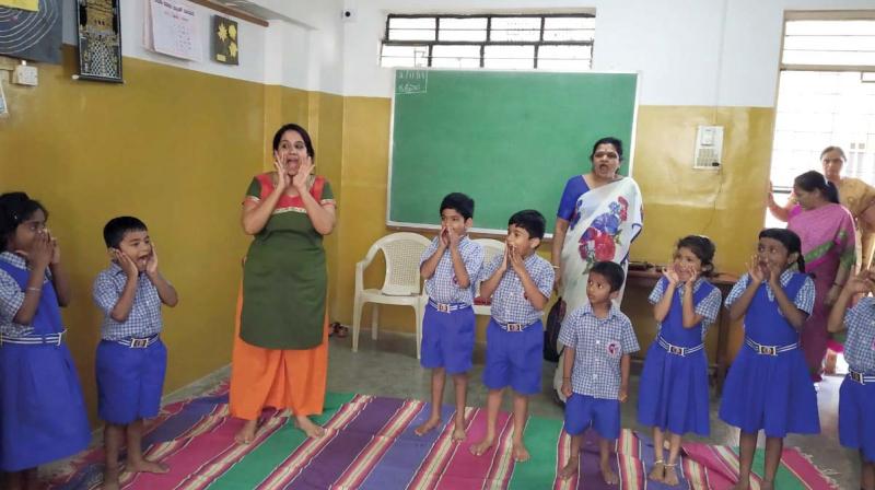 A drama therapy session being held for schoolchildren by Chiranthana  	DC
