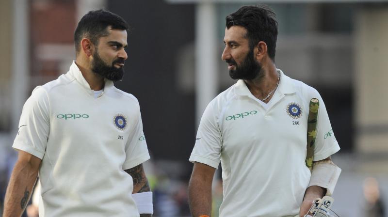 Overnight batsmen, Cheteshwar Pujara and Virat Kohli, will be eager to strengthen Indias position on Day three of the third Test against England in Nottingham. (Photo: AP)