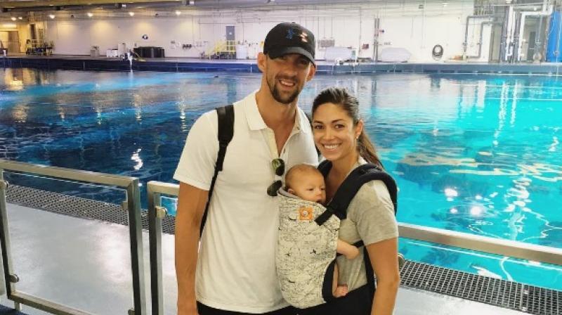 Michael Phelps and Nicole Johnson with their son Boomer. (Photo: Michael Phelps Instagram)
