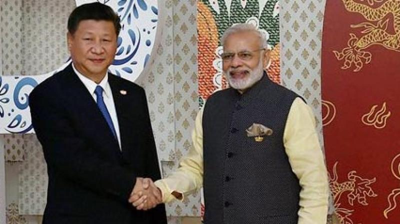 Prime Minister Narendra Modi welcomes Chinese President Xi Jinping for the BRICS Summit in Benaulim, Goa (Photo: AP)