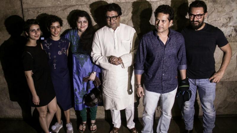 Aamir with Raj Thackeray, Sachin Tendulkar, his on-screen daughters, Sanya Malhotra and Fatima Sana Shaikh at the premiere of Dangal.
