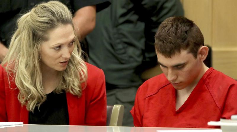 19-year-old Nikolas Cruz is accused of carrying out the second-deadliest shooting at a public school in US history after a deal between prosecutors and defence attorneys, the suspects lawyer said. (Photo: AP)