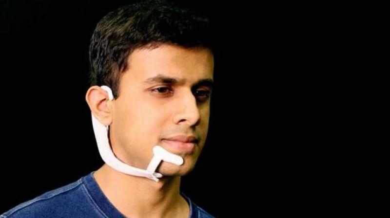 Electrodes in the device pick up neuromuscular signals in the jaw and face that are triggered by internal verbalisations -saying words in your head - but are undetectable to the human eye. (Photo: MIT)