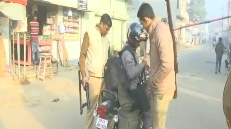 Security has been heightened in Ayodhya on the 25th anniversary of Babri Demolition. (Photo: ANI/Twitter)