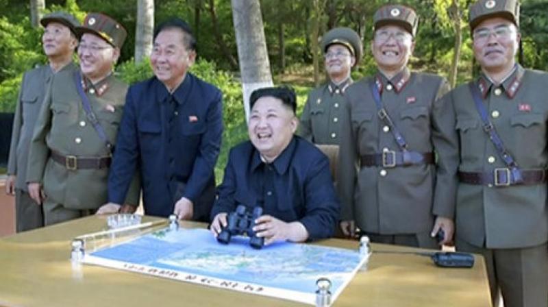 North Korean leader Kim Jong Un, center, watches the test launch of what was said to be the Pukguksong-2 missile (Photo: AP)