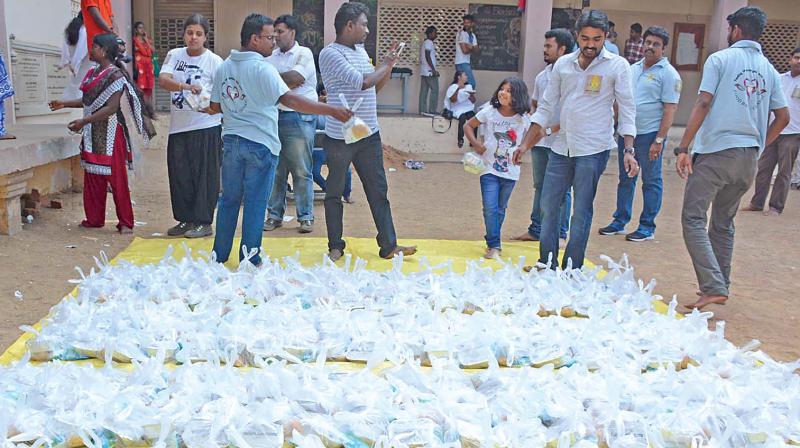 Volunteers of a non-profit group ready with 2,000 packets to be distributed to the homeless in Chennai (Photo: DC)