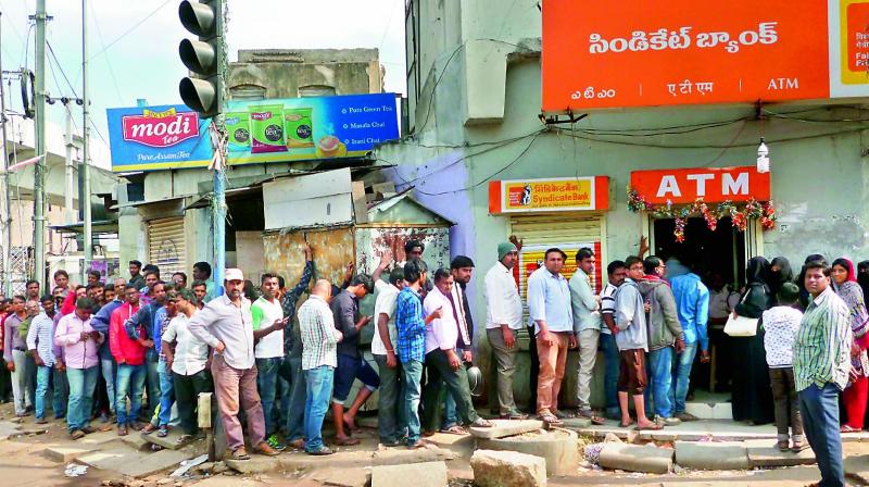 Most of the people in Hyderabad spent their Sunday holiday waiting for long hours to withdraw money from ATMs.  (Photo: DC)