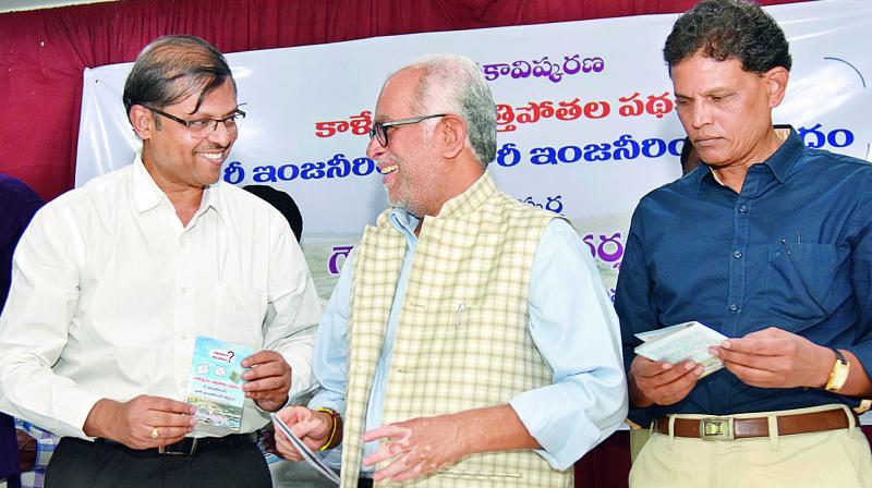 Former judge of Supreme Court Justice B. Sudarshan Reddy releases a book on Kaleshwaram lift irrigation scheme in Hyderabad on Tuesday.