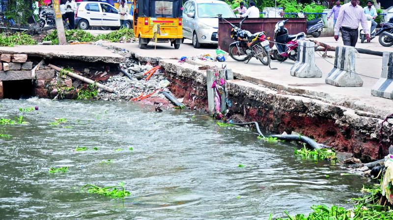 Due to the heavy rains in the city the Musi bridge near Nachram has caved in on Wednesday. Pedestrians taken the bridge are at a risk.